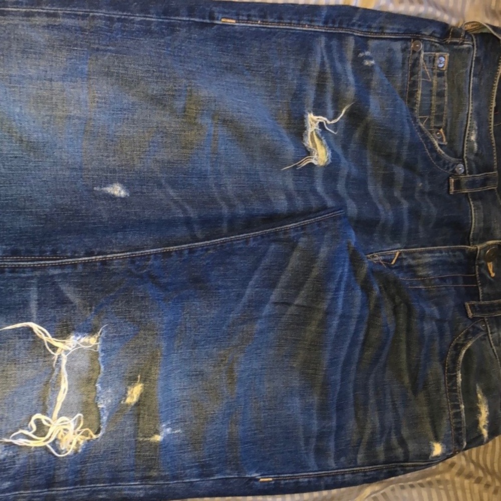 Worn pair of true religion jeans
